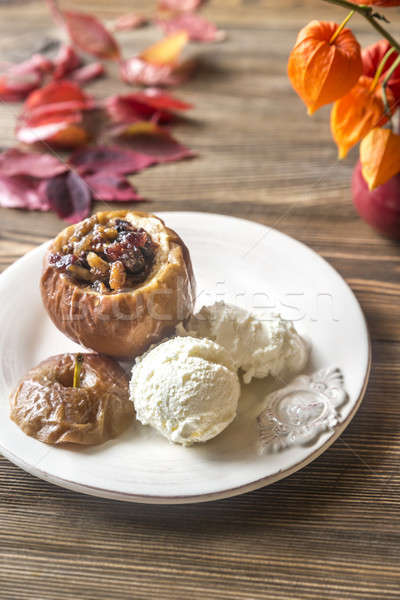 Stuffed baked apple on the plate Stock photo © Alex9500