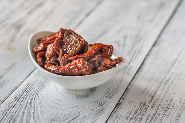 Bowl of sun-dried tomatoes Stock photo © Alex9500