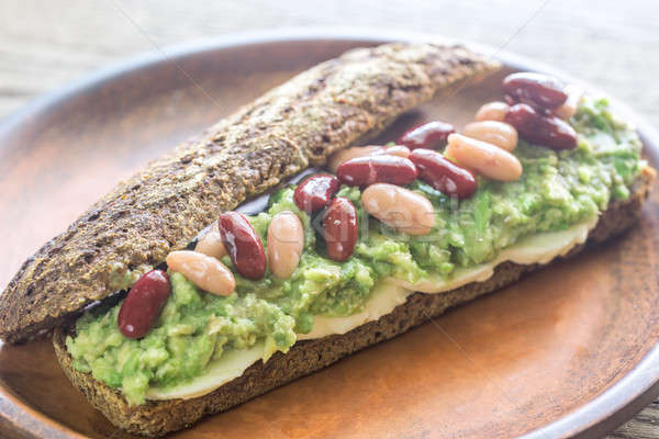 Sandwich with smashed avocado and kidney beans Stock photo © Alex9500