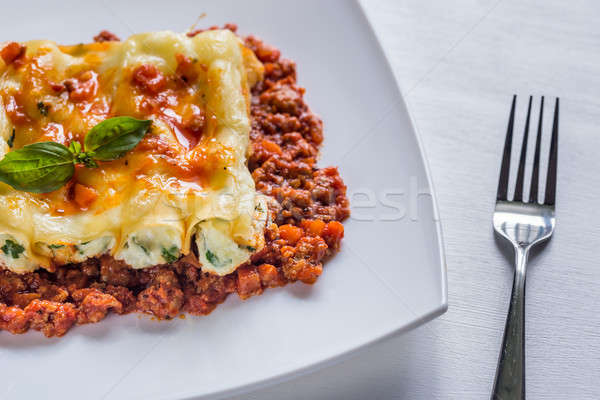 Canelloni stuffed with ricotta with bolognese sauce Stock photo © Alex9500