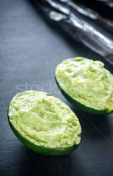 Guacamole in avocado shells Stock photo © Alex9500