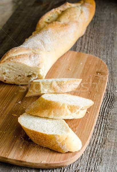 Szeletel francia kenyér francia kenyér asztal csoport kenyér Stock fotó © Alex9500