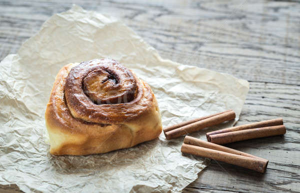 Cinnamon roll on the wooden background Stock photo © Alex9500