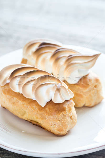 Eclairs with lemon curd and meringue Stock photo © Alex9500
