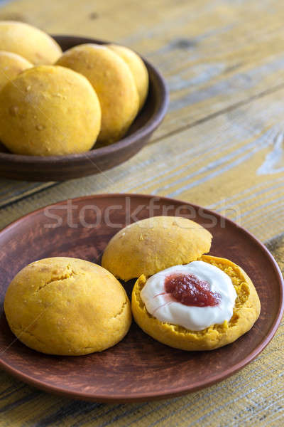 Pumpkin scones with cream and fruit jam Stock photo © Alex9500