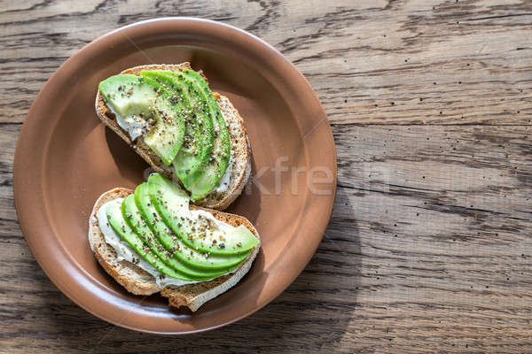 Toasts with tahini sauce and sliced avocado Stock photo © Alex9500