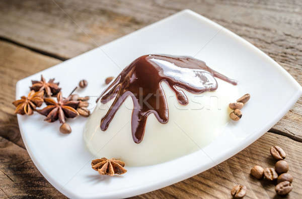 Panna cotta under chocolate topping Stock photo © Alex9500