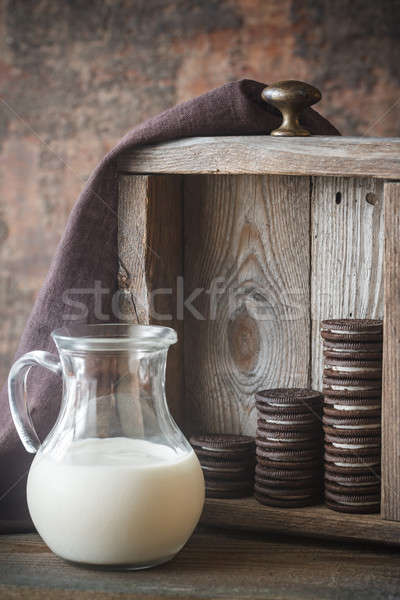 шоколадом Cookies сливочный заполнение кувшин молоко Сток-фото © Alex9500