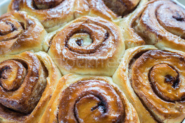 Cinnamon rolls on the wooden background Stock photo © Alex9500