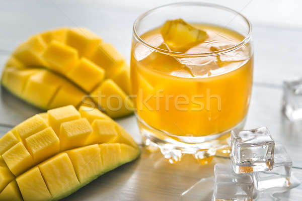Mango juice on the wooden table Stock photo © Alex9500