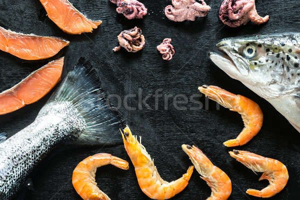 Frutos do mar preto peixe laranja espaço jantar Foto stock © Alex9500