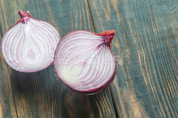 Red onion on the wooden background: cross section Stock photo © Alex9500
