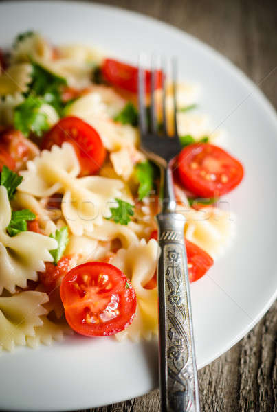 Pasta tomates cherry alimentos fondo restaurante placa Foto stock © Alex9500