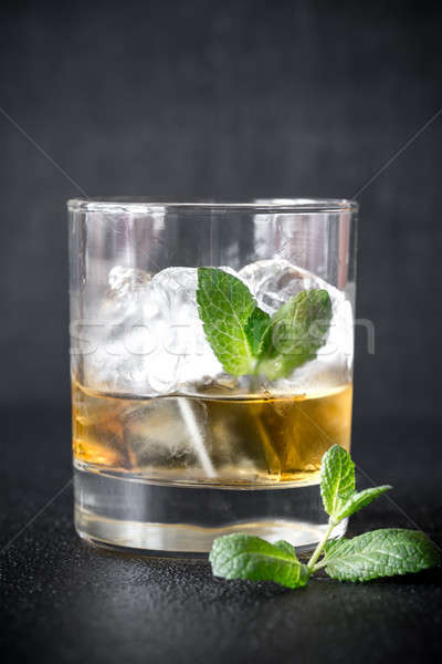 Glass of rum on the dark background Stock photo © Alex9500