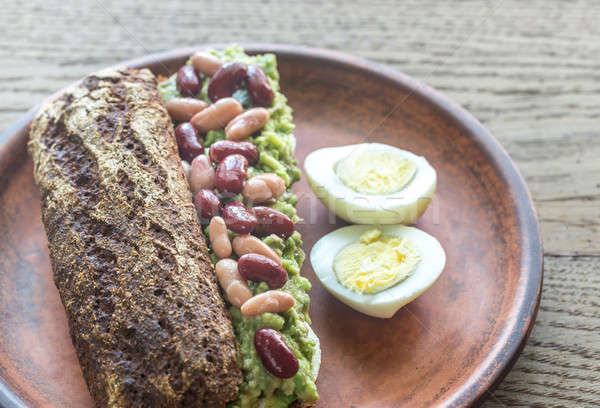 Sandwich with smashed avocado and kidney beans Stock photo © Alex9500