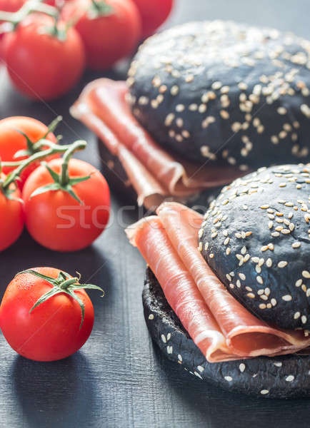 Black sandwich with prosciutto ham Stock photo © Alex9500