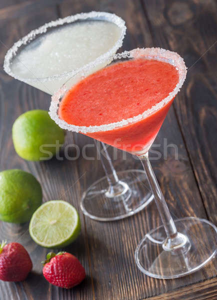 Glasses of lime and strawberry margarita cocktail Stock photo © Alex9500