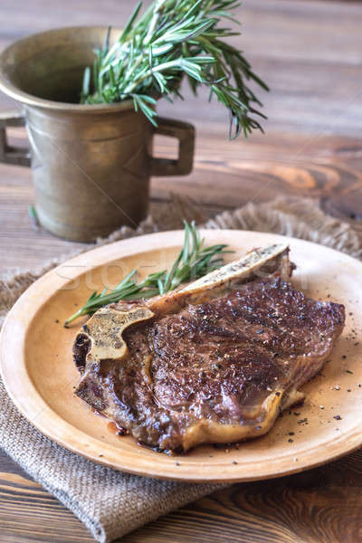 Beef steak with fresh rosemary Stock photo © Alex9500