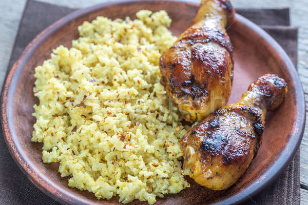 Spicy chicken drumsticks with rice curry Stock photo © Alex9500