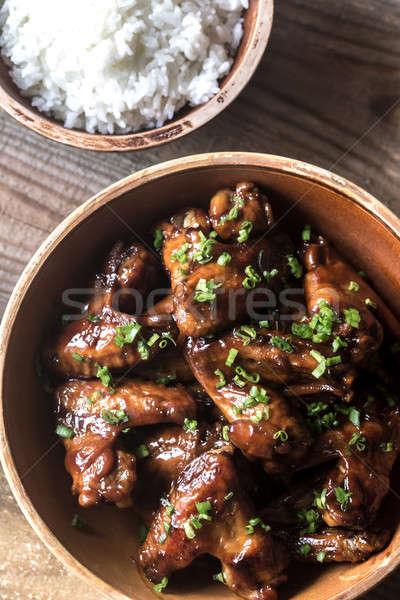 Bowl of teriyaki chicken wings with rice Stock photo © Alex9500