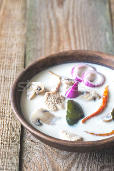 Bowl of thai tom kha kai soup Stock photo © Alex9500
