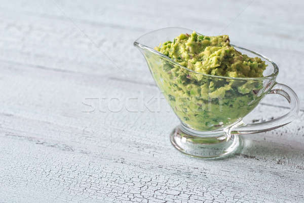 Guacamole in glass gravy-boat Stock photo © Alex9500