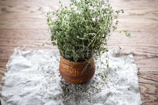 Fresh thyme on the wooden background Stock photo © Alex9500