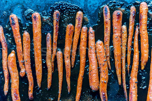 Stock photo: Glazed carrots on the baking tray