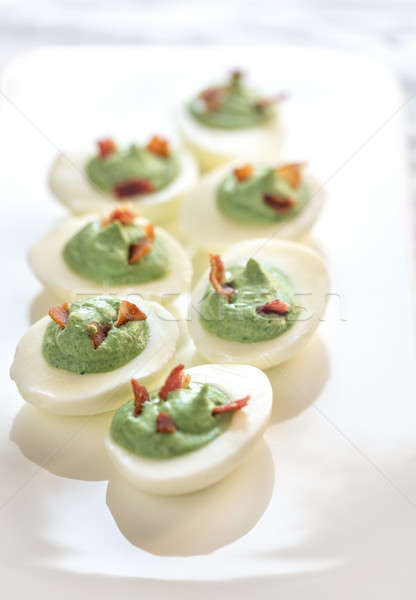 Spinach and bacon deviled eggs Stock photo © Alex9500