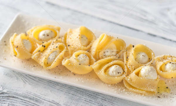Lumaconi pasta stuffed with bocconcini Stock photo © Alex9500