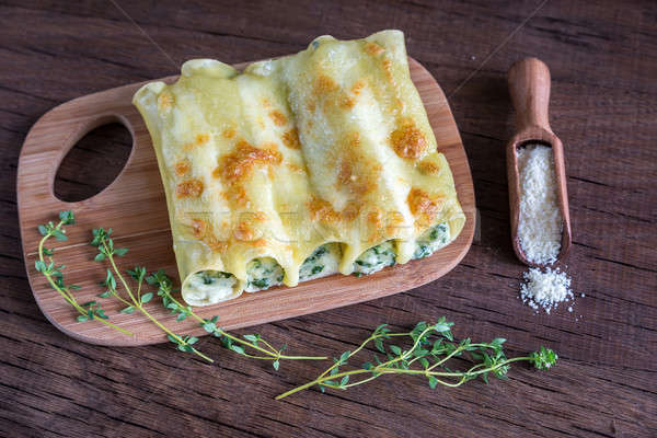 Cannelloni with ricotta and spinach on the wooden board Stock photo © Alex9500