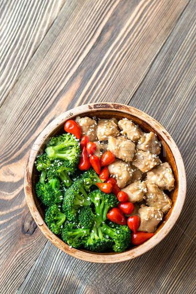 Bowl of broccoli and chicken stir-fry Stock photo © Alex9500