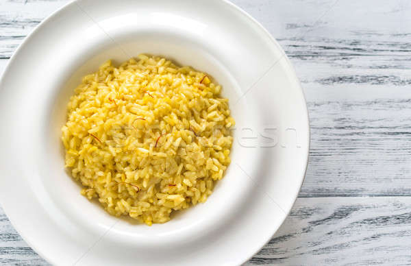 Risotto naranja mesa queso cena placa Foto stock © Alex9500