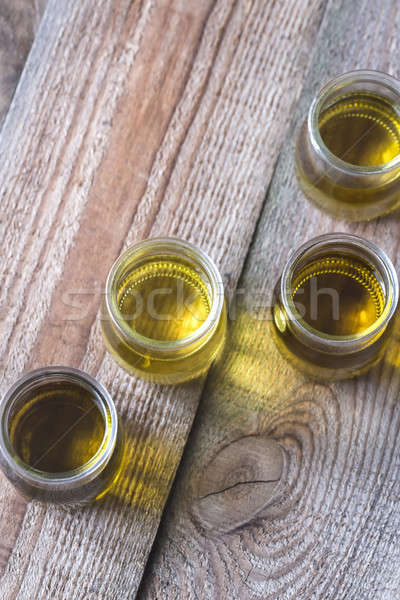 Glass jars with different kinds of nut oil Stock photo © Alex9500