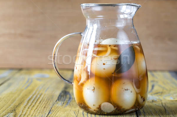 Pickled eggs in the glass jug Stock photo © Alex9500