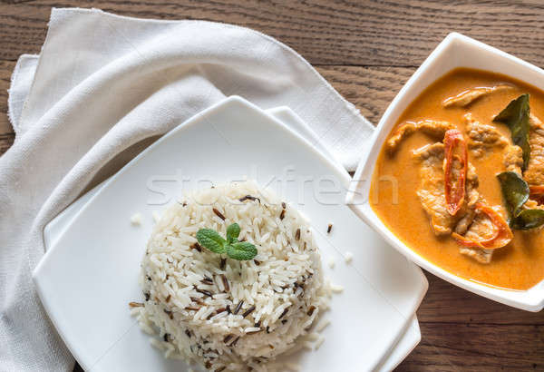 Thai panang curry with bowl of white and wild rice Stock photo © Alex9500