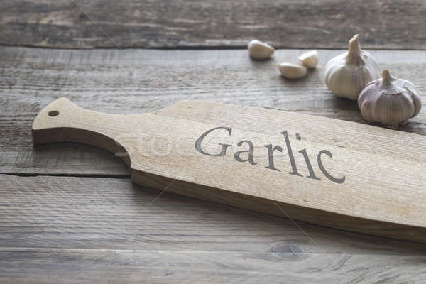 Garlic on the wooden background Stock photo © Alex9500