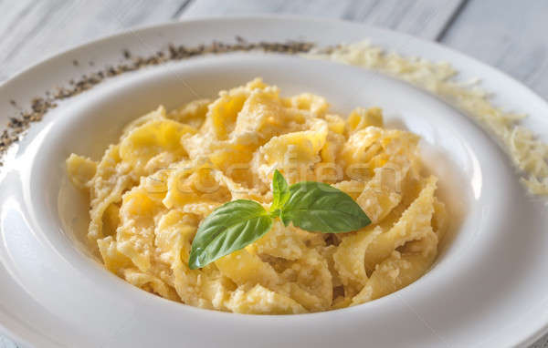 Stock photo: Portion of fettuccine Alfredo