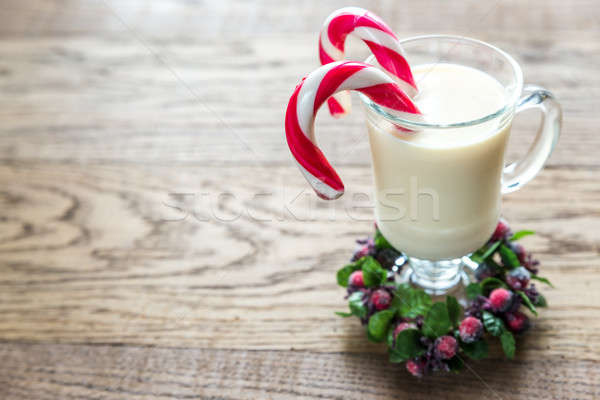 A glass of eggnog with mince pies Stock photo © Alex9500