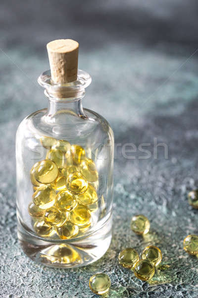 Omega-3 fish oil capsules in the glass bottle Stock photo © Alex9500