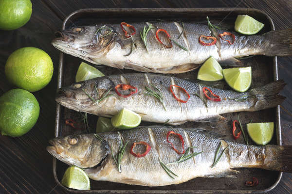 Baked sea bass with lime and chilli pepper Stock photo © Alex9500