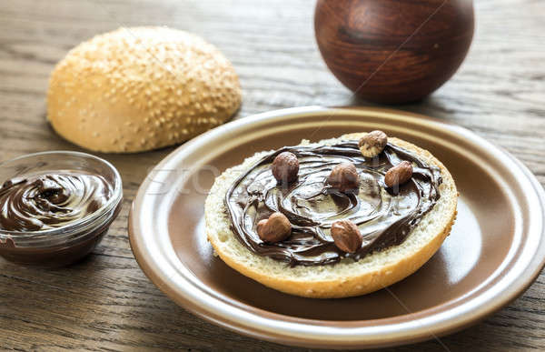 Seasame bun with chocolate cream and nuts Stock photo © Alex9500