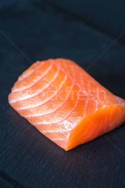 Salmon on the black stone board Stock photo © Alex9500