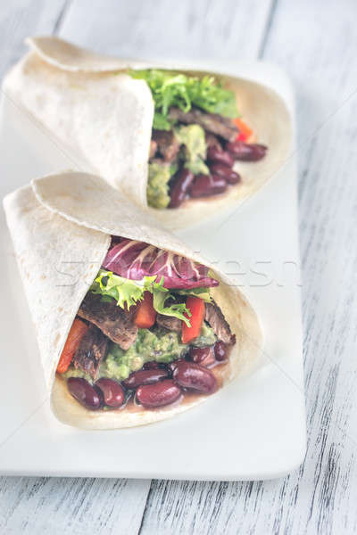 Burritos on the white plate Stock photo © Alex9500