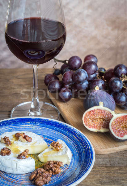 Red wine with camembert, figs and grapes Stock photo © Alex9500