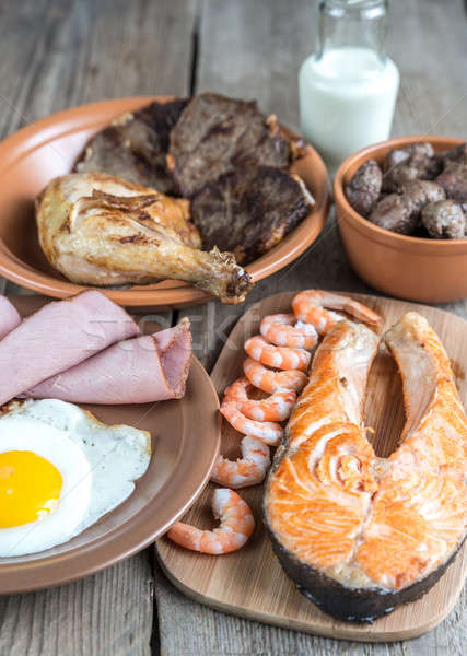 Protein diet:cooked products on the wooden background Stock photo © Alex9500