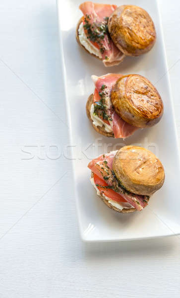 Mushroom burgers with jamon, cream cheese and mint sauce Stock photo © Alex9500