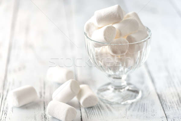 Glass bowl of marshmallows on the wooden background Stock photo © Alex9500