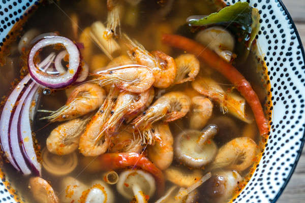 Bowl of thai tom yum soup Stock photo © Alex9500