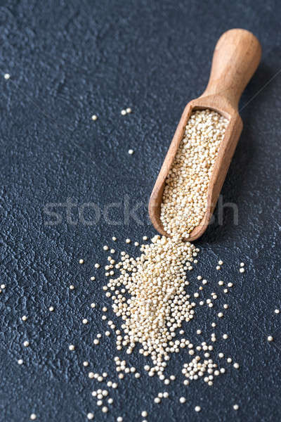 Stock photo: Scoop of raw quinoa